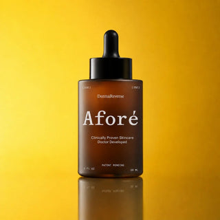 DermaReverse serum on a yellow gradient background 